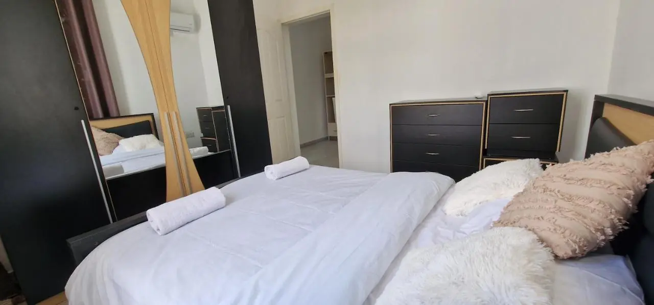 Elegant second bedroom with contemporary luxury design at Luxora Villa Grand Baie