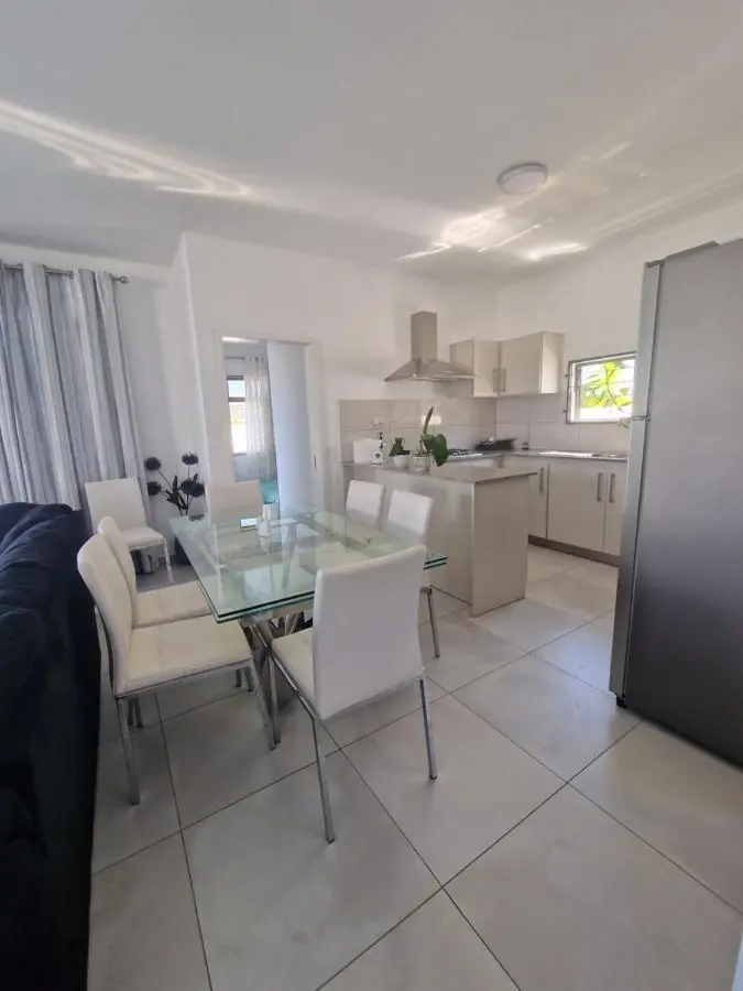 Fully equipped luxury self-catering kitchen and dining area at Luxora Villa, perfect for family holidays in Mauritius