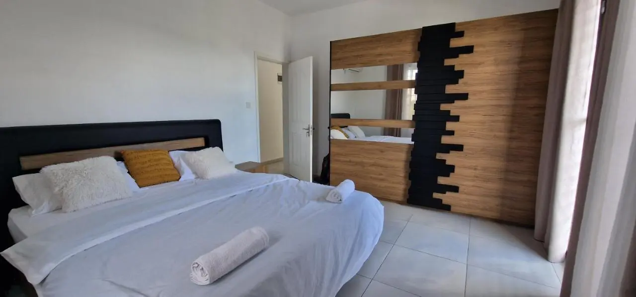 Luxury 3-bedroom accommodation with king-size bedding at Luxora Villa Pereybere, Mauritius