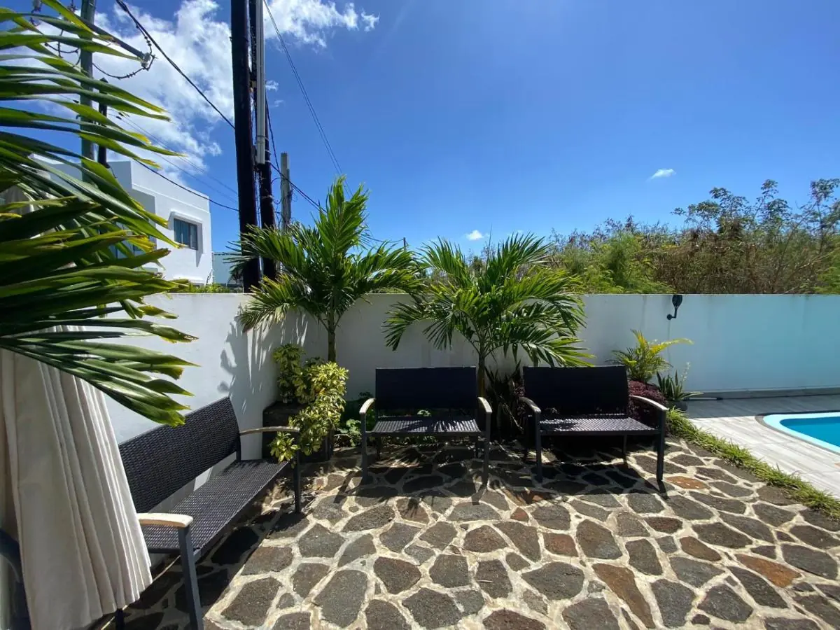 Private pool and luxury seating area at Luxora Villa, your luxury holiday villa in Mauritius