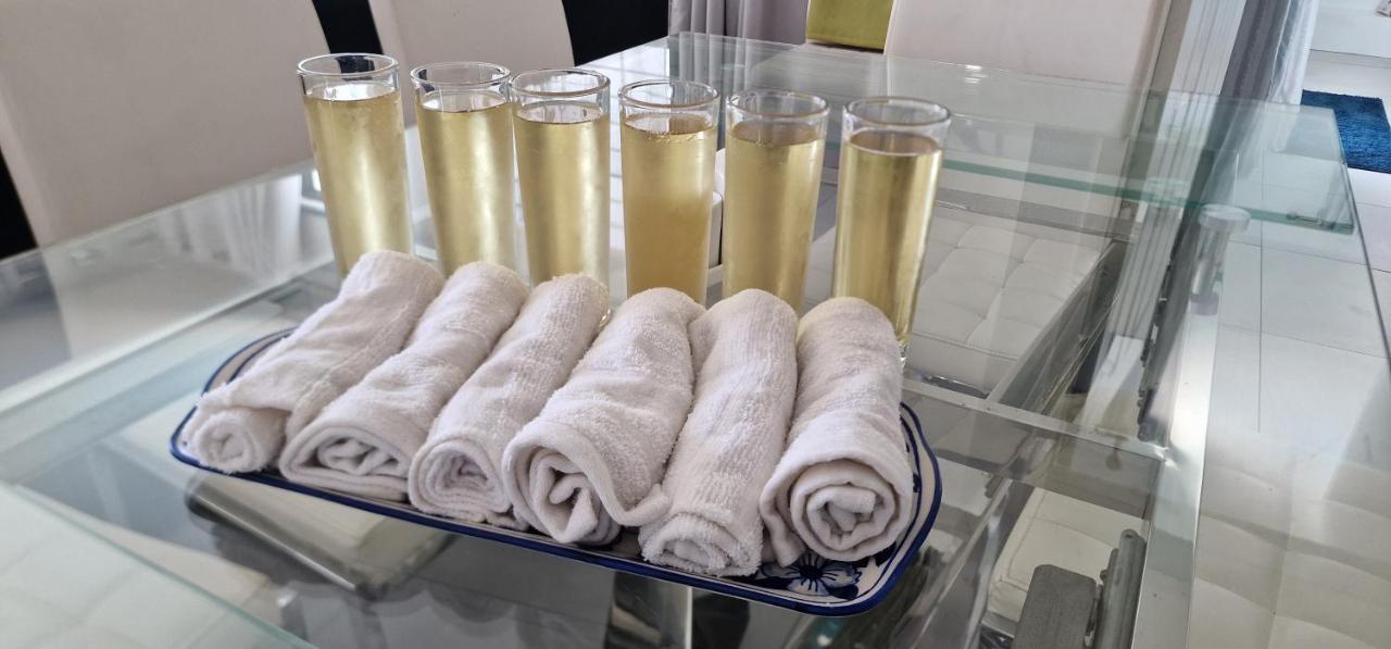 Welcome towels and champagne at Luxora Villa Mauritius